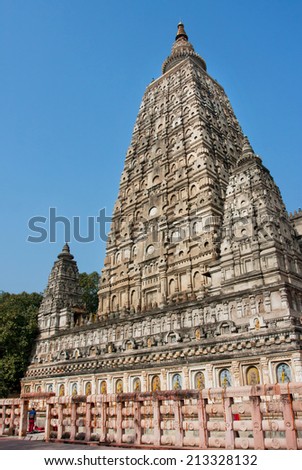 Stone towers of beautiful Mahabodhi Temple (Great Awakening) built in 3rd century B.C. by Emperor Asoka in Bodh Gaya, India. It is earliest Buddhist temples built entirely in brick, from Gupta period