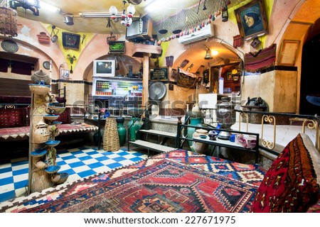 ZANJAN, IRAN - OCT 7: Interior of historical Persian cafe house with old carpets, vintage furniture and arts on October 7, 2014. With a population of 400.000, Zanjan is the 20th largest city in Iran