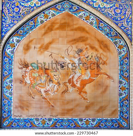 ISFAHAN, IRAN - OCT 14: Persian painting on colorful tile with riders play polo on square on October 14 2014. Third largest city in Iran, Isfahan is outstanding example of Iranian & Islamic culture