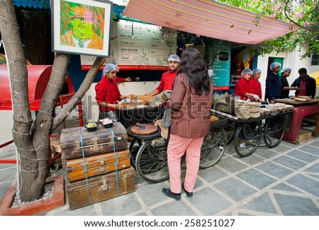 JAIPUR, INDIA - JAN 21: Hungry people vizit the pizzeria in food court zone of the Jaipur Literature Festival on January 21 2015. Starts in 2006, the festival is the world\'s largest literary festival