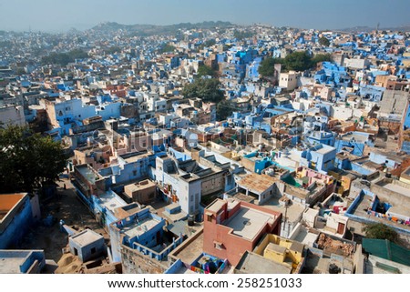 JODHPUR, INDIA - JAN 28: Cityscape with many colorful indian houses in Rajasthan state on January 28, 2015. Jodhpur, with population 1,290,000 people, is a center of Marwar region of India