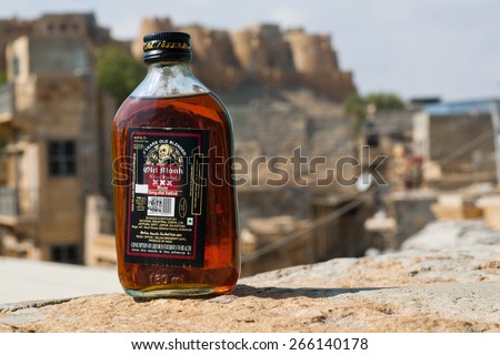 JAISALMER, INDIA - MARCH 1: Illustrative editorial photo of the bottle of rum Old Monk, an iconic vatted Indian dark rum, launched in 19th December 1954. Blended and aged for a minimum of 7 years.