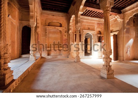 JAISALMER, INDIA - MAR 1: Columns inside the carved historical rooms of mansion in old city on March 1, 2015. Jaisalmer lies in the heart of the Thar Desert and has a population of about 78,000.