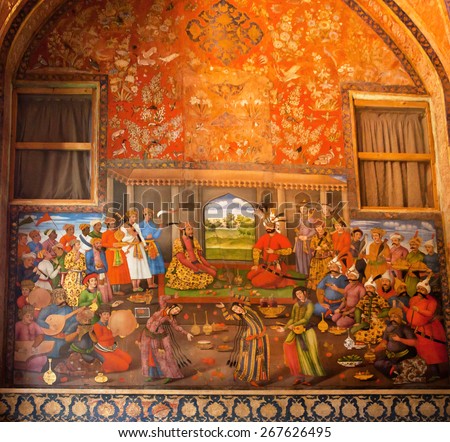ISFAHAN, IRAN - OCT 17: Dinner with belly dances in the king palace on the wall fresco in palace Chehel Sotoun on October 17, 2014. Safavid era \