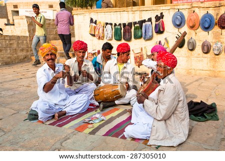 JODHPUR, INDIA - JAN 28: Emotional musicians play indian music on different instruments outdoor on January 28, 2015 in Rajasthan. Jodhpur with population 1,290,000 people, is center of Marwar region