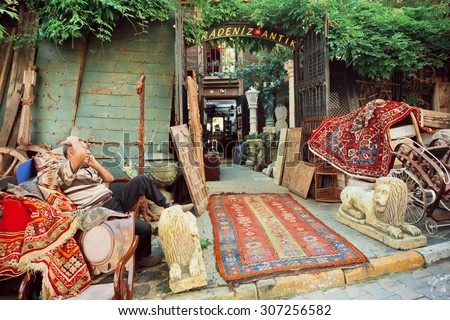 ISTANBUL - 23 JULY: Flea market with antique furniture and asian carpets on the street with vintage shops on July 23, 2015 in Cukurcuma. Istanbul is the world\'s fifth-most-popular tourist destination
