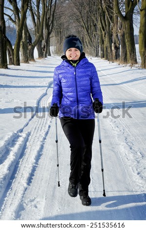 woman train nordic walking