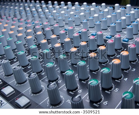 Knobs of an audio mixing board