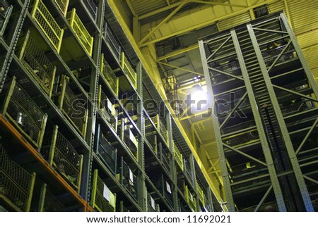 An industrial factory\'s on-site high rise parts storage warehouse.