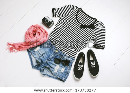 Overhead of essentials of a modern woman.Outfit of casual woman.