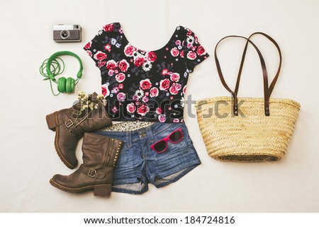 Overhead of essentials spring woman. Outfit of casual and modern woman.