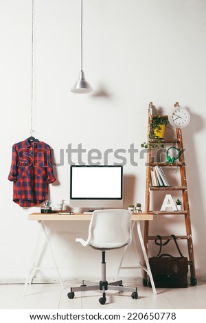 Industrial workspace with computer. / Minimal office on white background.