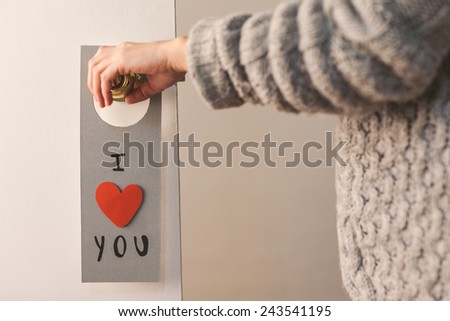 Diy note from Valentine\'s day./ Valentine\'s day lovely message hanging on a door.