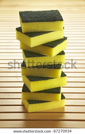 8 sponges to clean dishes stacked in the kitchen