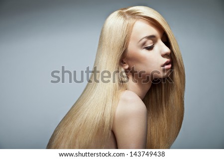 Well-being & spa. Sensual woman model with shiny straight long blond hair. Health, beauty, wellness, haircare, cosmetics and make-up