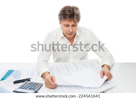 Male Architect Drawing On Blueprint isolated over white