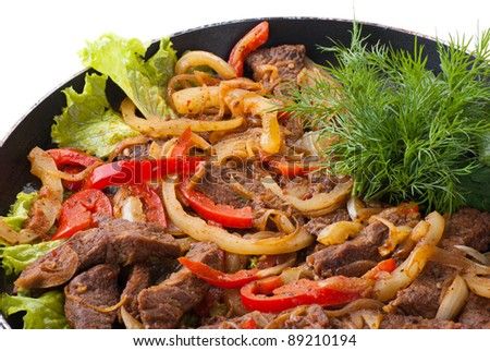 traditional mexican beef fajitas on white background