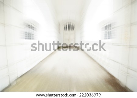 High key of zooming door. Image with blur zoom effect