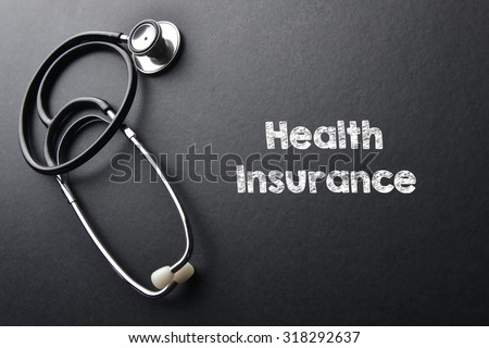 Health insurance word with stethoscope - health concept. Medical conceptual