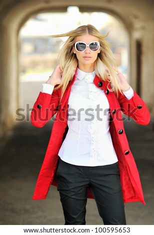 Glamour portrait of beautiful young woman model in big fashion white sunglasses