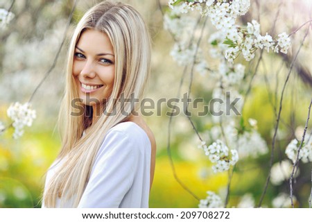 Beautiful blonde woman in spring