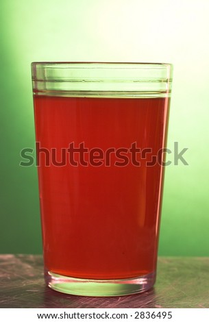 a glass of fizzy pink drink