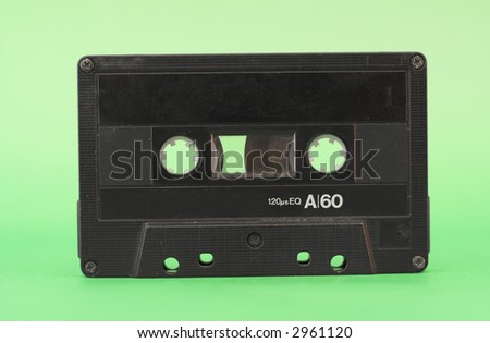 retro audio  tape placed over green