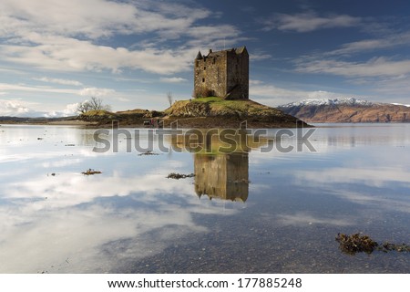 Castle Stalker reflecting on Loch Linnhe in the west coast of Scotland