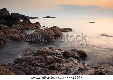Sunset on a rocky west of Scotland coast