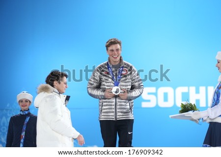 SOCHI RUSSIA - February 13TH: Gus Kenworthy stands on the Olympic Podium with a silver medal in the Olympic park on February 13th, 2014 in Sochi, Russia.