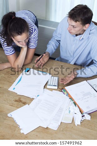 Couple talking about debt and financial problems