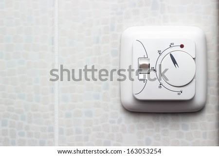 Thermoregulator Of Electric Heating Floor On The Wall