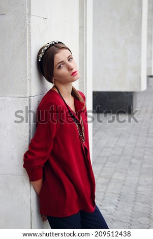 Young model girl in classic clothes