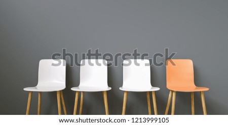 Row of chairs with one orange. Job opportunity. Business leadership. recruitment concept