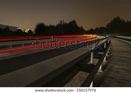 long time exposure on a roadway with car light trails