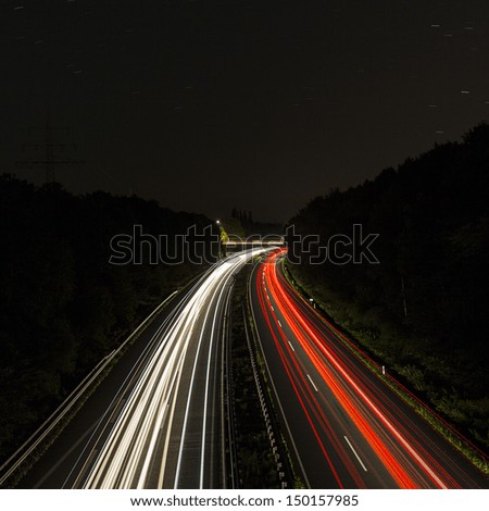 long time exposure on a highway with car light trails