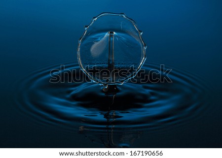 liquid art Water drop collision splash a Liquid Sculpture like a figure in blue colors