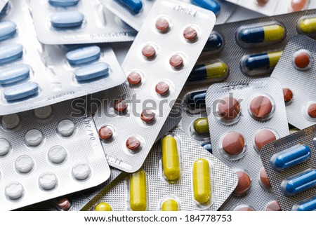 Tablets pills capsules in a Blister packaging heap medicine medical antibiotic flu pharmacy