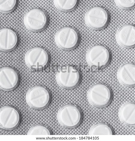 White pills in Blister packaging antibiotic pharmacy medicine medical flu