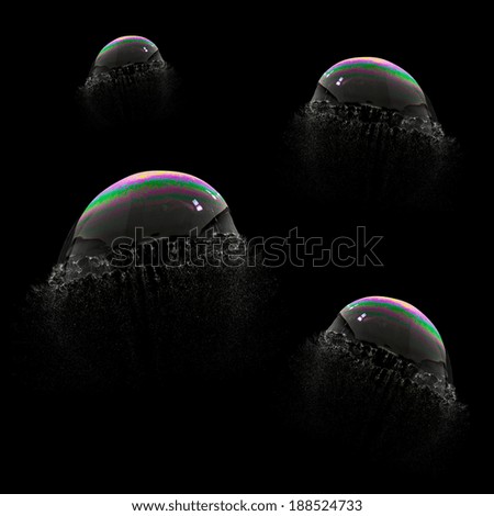 Exploding Soap Bubble like a jellyfish set collage on black background