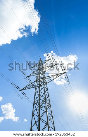 electricity pylon on blue cloudy sky electricity production power energy