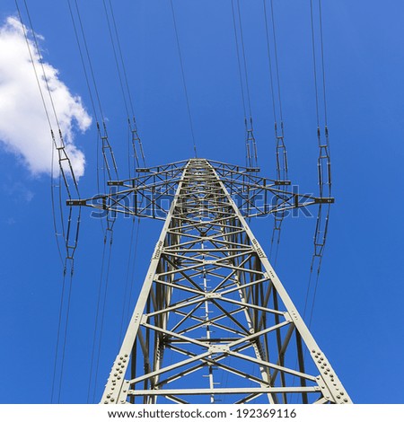 metal Electricity pylon on blue sky with clouds infrastructure electricity production