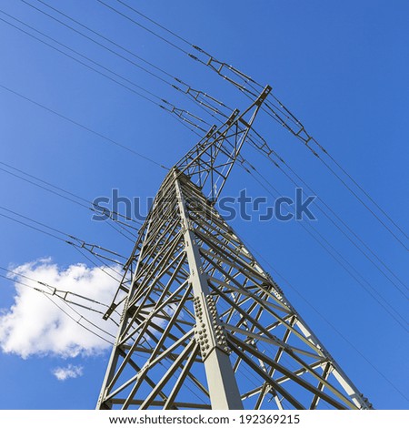 Electricity pylon on blue sky with clouds electricity overhead line solar energy