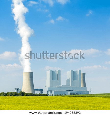 lignite-fired power plant with cooling tower in summer