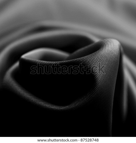 a wrinkled black silk cloth