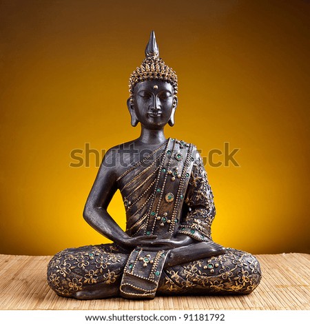 Buddha statue  against golden background