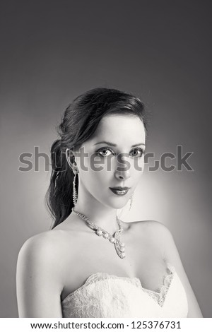 Bride beautiful woman in wedding dress - wedding style. Black and white