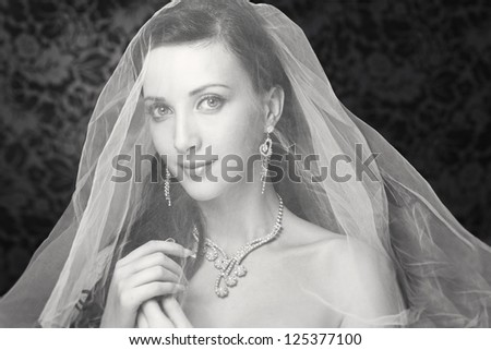 Bride beautiful woman in wedding dress - wedding style. Black and white