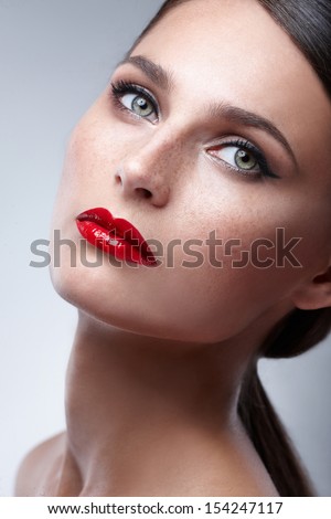 Fashion Beauty Makeup. Beautiful Woman With Red Lips And Luxury Makeup. Beautiful Face