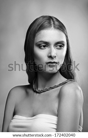 portrait of young beautiful woman with clean skin and Long hair. Black and white